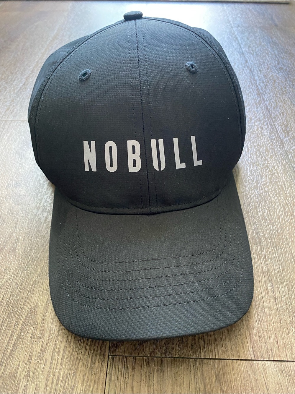 NOBULL Adjustable Black Baseball Cap with Reflective Logo